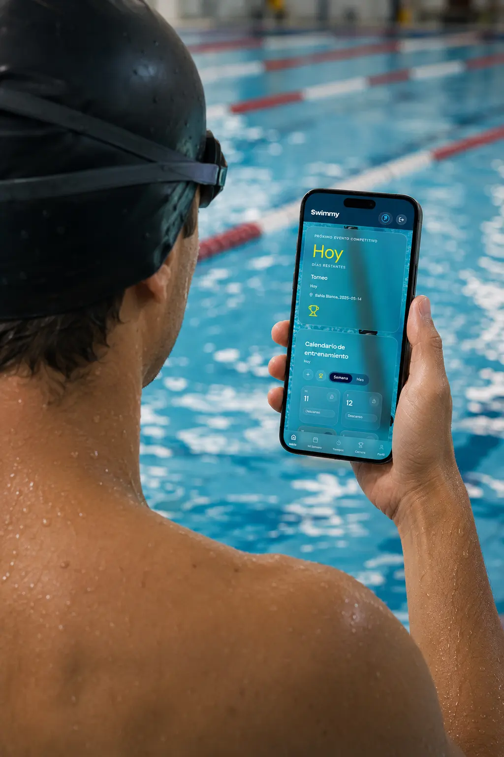 Swimmer on pool deck reviewing progress
